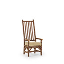Rustic Dining Arm Chair #1214 with Optional Loose Seat Cushion shown in Natural Finish (on Bark) La Lune Collection