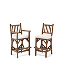 Rustic Bar Stool with Arms #1140 and Bar Stool #1138 shown in Natural Finish (on Bark) La Lune Collection