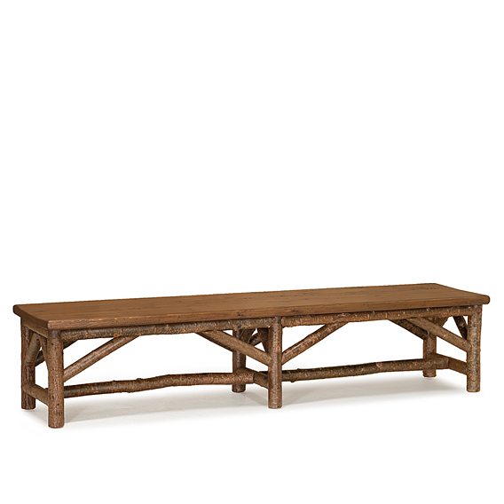 Rustic Bench #1528 shown in Natural Finish (on Bark)