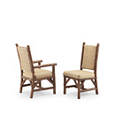 Rustic Dining Arm Chair #1186 & Dining Side Chair #1184 with Woven Leather Backs shown in Natural Finish (on Bark) La Lune Collection